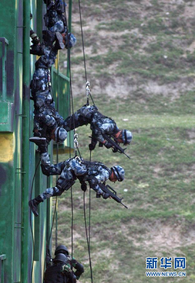 11��1�գ���ӡ��ս�����ս��Ա�ڡ��ս����С�2014�����Ϸ���ѵ���жԲ�����¥����ġ��ֲ����ӡ�ʵʩͻ����